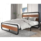 A modern bed with a sleek metal frame and an elegant wooden headboard.